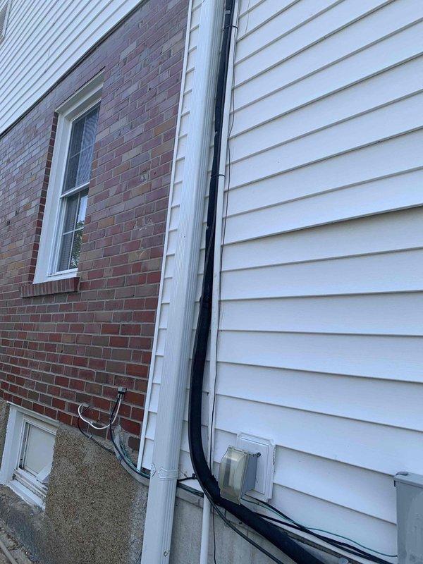 Installed suction line insulation on exterior HVAC refrigerant lines using customer-supplied materials. System tested and confirmed operational for both heating and cooling modes upon completion.