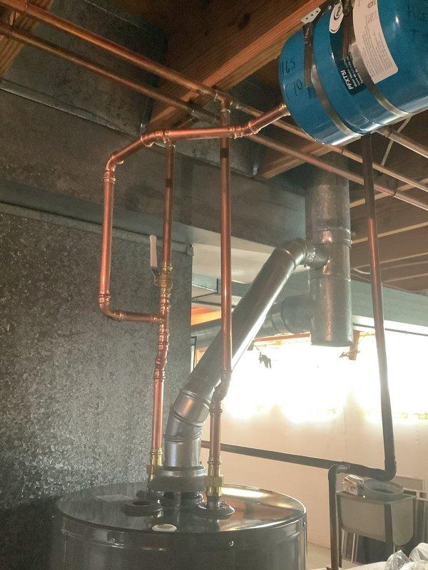 Installed a 50-gallon tall gas water heater per customer specifications. Coordinated delivery of Rheem unit from Ferguson supply and completed full installation including gas and water line connections with copper piping, pressure relief valve, and shut-off valves. Applied required plumbing identification sticker and obtained permit compliance for permit #26PLU-07791. All connections tested and verified for proper operation and code compliance.
