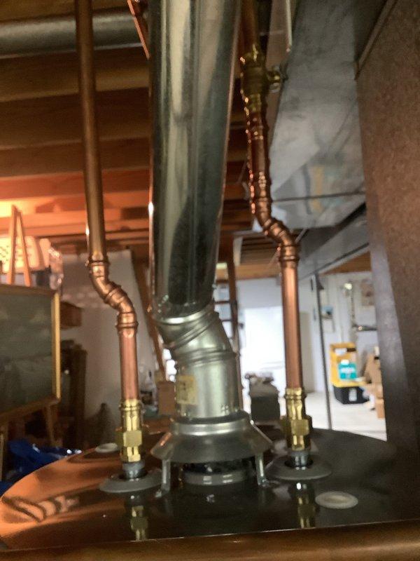 Installed a 50-gallon tall gas water heater per customer specifications. Coordinated delivery of Rheem unit from Ferguson supply and completed full installation including gas and water line connections with copper piping, pressure relief valve, and shut-off valves. Applied required plumbing identification sticker and obtained permit compliance for permit #26PLU-07791. All connections tested and verified for proper operation and code compliance.