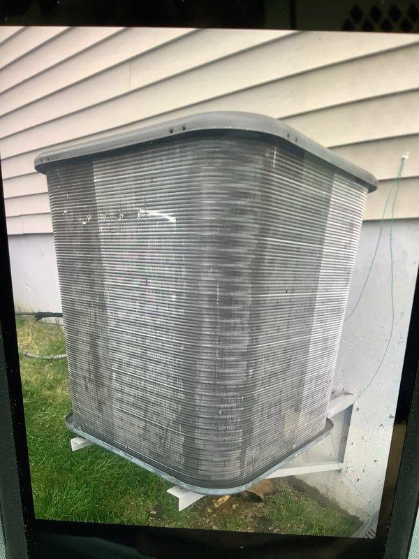 Responded to Home Depot lead F58872711 for a recall service call regarding AC not cooling issue. Inspected two residential split systems (5-year and 12-year units) located at side of home. Accessed indoor unit control board and verified all electrical connections, examined PCB wiring harness and control circuits. Inspected outdoor condenser unit mounted on brackets against exterior wall, confirmed refrigerant lines secure and unit operational. Documented system conditions with photos of control board assembly and outdoor equipment for warranty records.