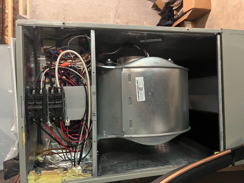 # HVAC Cooling System Tune-Up Completed

Performed comprehensive preventive maintenance tune-up on residential air conditioning unit located on side of home. Accessed indoor air handler unit, inspected electrical control panel including contactors and circuit breakers, verified all wiring connections secure. Examined blower motor assembly and internal components for proper operation. Replaced heavily soiled air filter showing significant particulate buildup and discoloration. Documented equipment condition through photography. System operational upon completion of maintenance service.