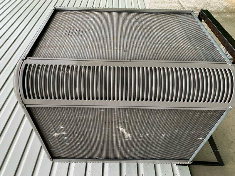 Completed preventative maintenance tune-up on single cooling unit located on elevated side of home. Inspected heat exchanger assembly, condenser coils, and filtration system; noted significant accumulation of dust, dirt, and debris on filter panels and condenser fins. Cleaned condenser coils, checked refrigerant levels, verified electrical connections, and tested system operation to ensure proper cooling performance.