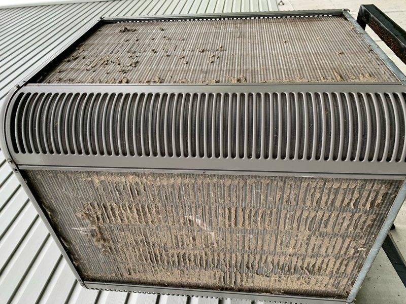 Completed preventative maintenance tune-up on single cooling unit located on elevated side of home. Inspected heat exchanger assembly, condenser coils, and filtration system; noted significant accumulation of dust, dirt, and debris on filter panels and condenser fins. Cleaned condenser coils, checked refrigerant levels, verified electrical connections, and tested system operation to ensure proper cooling performance.