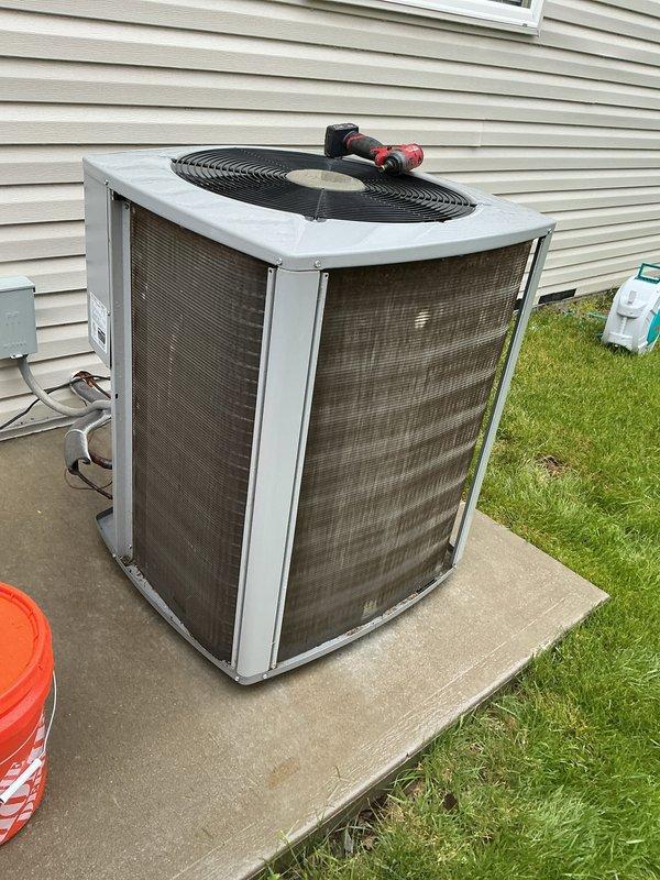 Completed comprehensive tune-up service on two 5-year-old residential air conditioning systems as part of Home Depot preventive maintenance program. Both condensing units, located on ground-level concrete pads with exterior disconnect boxes, were inspected, cleaned, and tested to ensure optimal performance and efficiency. All components on both systems were found to be in good working condition with proper airflow through mesh-protected coils and functioning fan assemblies.