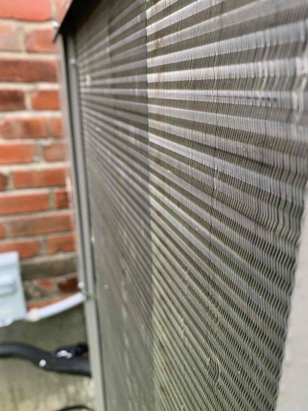 Completed comprehensive AC tune-up and maintenance on single outdoor condensing unit aged 0-5 years. Inspected condenser coil fins which were found in clean condition with no debris buildup, verified proper airflow through heat exchanger, and examined internal electrical components including transformer, capacitor, and wiring connections for secure mounting and proper operation. All system components functioning within normal parameters with no deficiencies noted.