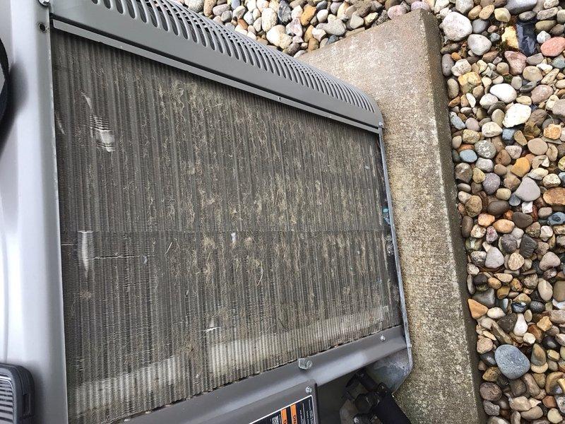 Completed comprehensive cooling system tune-up on outdoor condensing unit located at side of home. Performed full preventive maintenance inspection including cleaning of condenser coils, checking refrigerant levels, testing electrical connections, verifying proper airflow through top discharge grille, and ensuring unit operational efficiency. Customer enrolled in Classic Membership program for ongoing maintenance coverage.