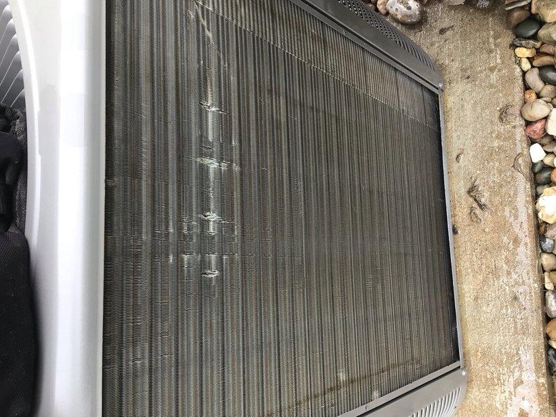 Completed comprehensive cooling system tune-up on outdoor condensing unit located at side of home. Performed full preventive maintenance inspection including cleaning of condenser coils, checking refrigerant levels, testing electrical connections, verifying proper airflow through top discharge grille, and ensuring unit operational efficiency. Customer enrolled in Classic Membership program for ongoing maintenance coverage.