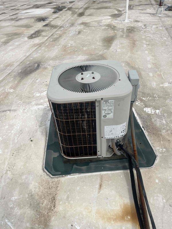 Responded to rooftop HVAC units requiring repair work on two separate systems. Successfully replaced failed capacitor on TRA-4 unit, restoring proper operation. Performed comprehensive leak search on TRA-5 system, accessing internal components and inspecting refrigerant lines, coils, and connections. Both units are rooftop-mounted cylindrical condensers serving the building. Parts utilized from truck stock inventory for immediate completion of repairs.