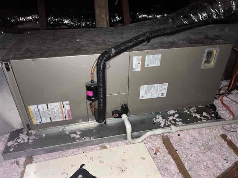 Responded to no cooling call where thermostat was functional but air conditioning system would not activate. Accessed attic-mounted air handler unit and performed diagnostic evaluation of system components. Inspected air handler cabinet, refrigerant lines, condensate drain, electrical connections, and ductwork. Verified air filter condition and proper installation. Identified system failure point and completed necessary repairs to restore cooling operation. System tested and confirmed operational upon completion.