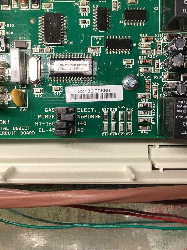 Responded to no cooling call on 10+ year old unit located on right side of home. Upon arrival, diagnosed failed compressor preventing system operation. Accessed control board assembly and documented existing electronic control components including circuit board with multiple relays, 24VAC transformer connections, and associated wiring. Inspected heat exchanger, copper refrigerant lines, and electrical connections to control board. Photographed control board model ML193UH with Lenox Industries components showing circuit layout, relay positions, and wiring configuration for service documentation and potential replacement parts identification.