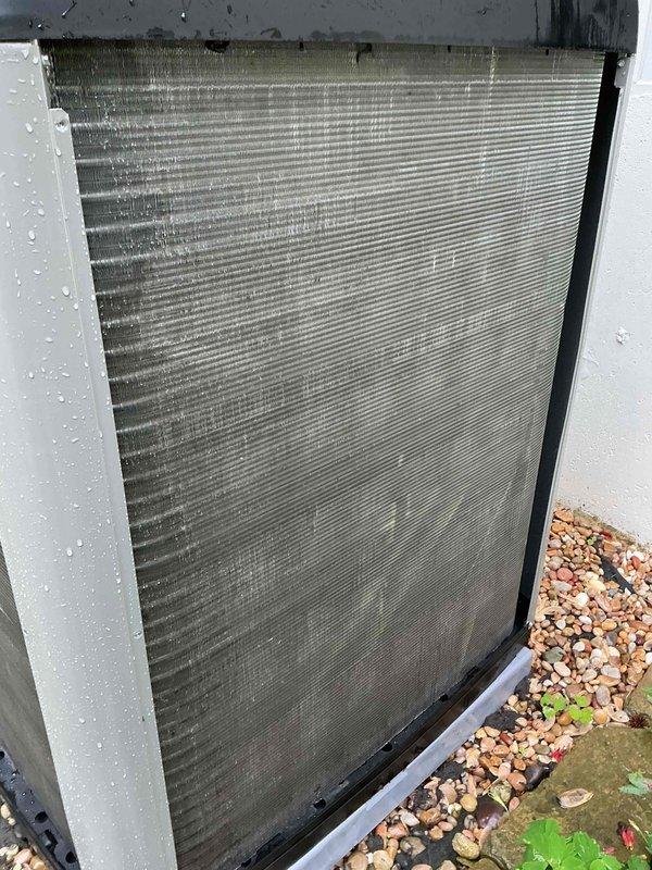 Completed routine maintenance and performance evaluation on outdoor heat pump unit. Performed comprehensive system inspection including condenser coil assessment, which showed normal operational condition with minor surface debris accumulation typical of outdoor exposure. Verified proper airflow through finned coil assembly and confirmed heat exchange surfaces were functioning adequately. Conducted temperature differential testing using calibrated digital thermometers, recording supply air temperature of 48°F with satisfactory performance metrics indicating proper refrigerant cycle operation. All system components inspected and found operating within manufacturer specifications. Unit left in proper working condition.