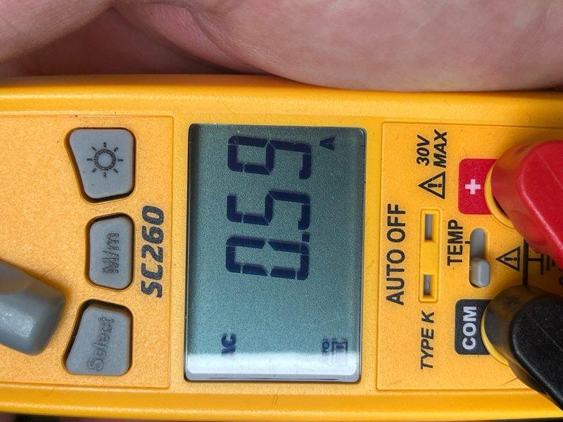 Completed seasonal cooling system tune-up on 6-year-old residential air conditioning unit. Performed comprehensive system inspection and maintenance including temperature differential measurements, with supply air reading 63°F. All components tested and found operating within normal parameters, system ready for cooling season.