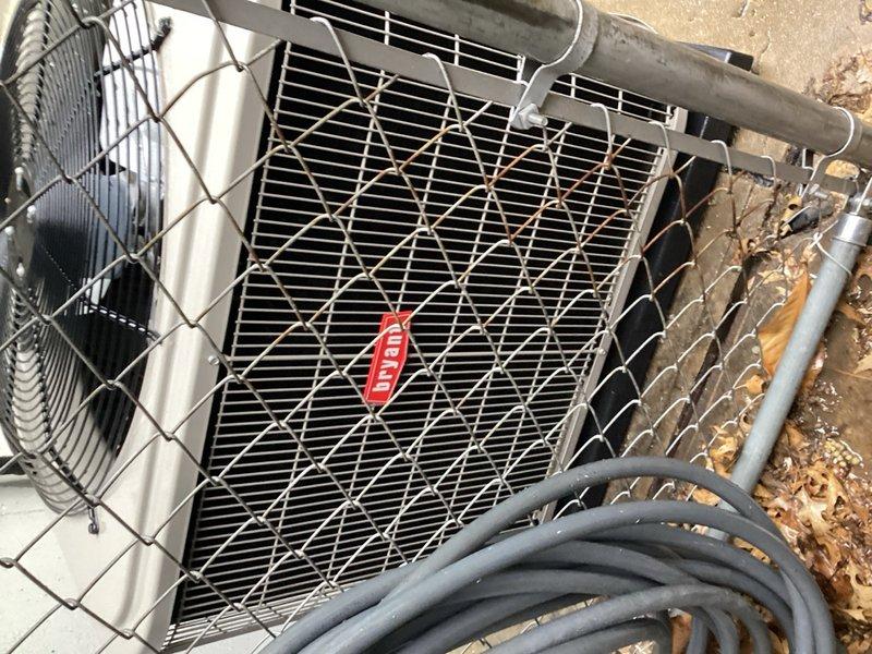 Responded to no cooling call on 9-year-old Bryant air conditioning system. Upon arrival, confirmed indoor blower operational but outdoor unit not running. Inspected outdoor disconnect fuse box and verified Line 2 fuse failure via indicator light. Replaced failed fuse, restored power to condensing unit, and confirmed compressor and condenser fan motor operation. Tested system performance and verified proper cooling cycle restoration. Unit returned to normal operation.
