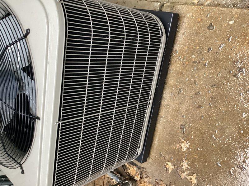 Responded to no cooling call on 9-year-old Bryant air conditioning system. Upon arrival, confirmed indoor blower operational but outdoor unit not running. Inspected outdoor disconnect fuse box and verified Line 2 fuse failure via indicator light. Replaced failed fuse, restored power to condensing unit, and confirmed compressor and condenser fan motor operation. Tested system performance and verified proper cooling cycle restoration. Unit returned to normal operation.