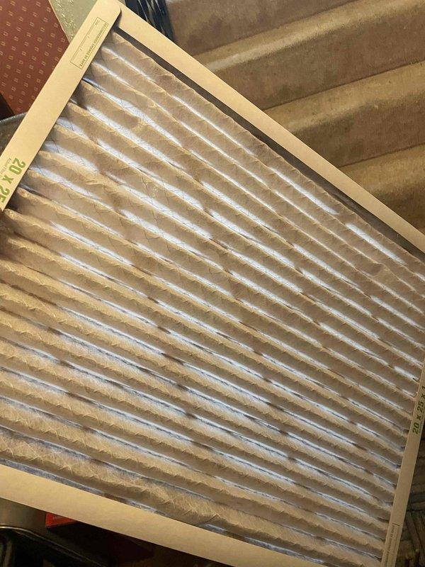 Completed comprehensive cooling season tune-up on 3-year-old outdoor air conditioning unit, including full system inspection, blower assembly examination, and electrical connection verification. Identified and documented heavily soiled air filter with significant particulate accumulation requiring immediate replacement to maintain proper airflow and system efficiency. Performed standard maintenance procedures to ensure optimal cooling performance for the upcoming season.