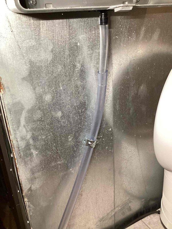 Completed recall service on residential HVAC system under 10 years old. Installed missing clamp on ductwork hose and replaced humidifier pad that was overdue for maintenance. System inspected and returned to proper operating condition.