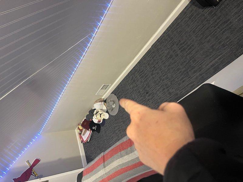 Responded to no cooling complaint in single room following recent system installation. Upon arrival, inspected affected area and located improperly connected or disconnected supply ductwork in ceiling plenum space. Verified vent register in room was not receiving adequate airflow from main AC system. Accessed attic/ceiling area, identified disconnected flexible duct run, and properly reconnected ductwork to supply plenum ensuring secure connection and proper airflow path. Verified system operation and confirmed adequate cooling airflow now present at room register. System restored to proper operation with all zones cooling effectively.