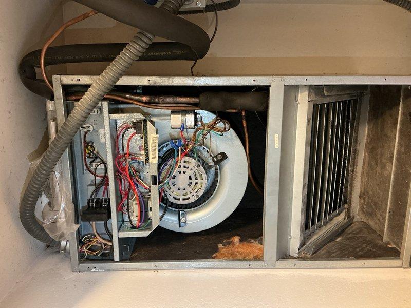 Replaced failed evaporator coil in air handler unit due to system malfunction. Removed old coil exhibiting significant dirt accumulation and corrosion, installed new replacement coil, and reconnected all refrigerant lines and electrical connections. Unit tested and restored to proper operation with adequate airflow and cooling capacity.
