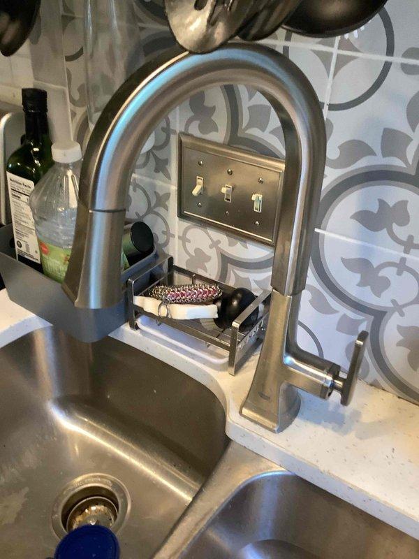 Responded to callback regarding low kitchen water pressure following 50-gallon gas water heater installation. Inspected kitchen faucet and water supply lines, verified proper water flow and pressure restoration at fixture. Confirmed water meter cover had been replaced and secured. Tested all connections for leaks, ensured system operating within normal parameters, and verified customer satisfaction with resolved pressure issue.