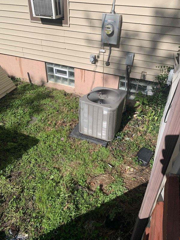 Completed preventative maintenance tune-up on 10-year-old residential AC condenser unit located at rear of property. Performed comprehensive system inspection, cleaned coils, checked refrigerant levels, tested electrical components, and verified proper operation of all mechanical systems. Unit showed normal wear consistent with age but is functioning within manufacturer specifications.