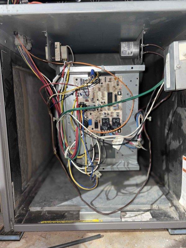Completed preventive maintenance tune-up on 10-year-old heat pump system located on west wall. Performed comprehensive inspection of unit including electrical components, control boards, capacitor, and transformer; all found to be operating within normal parameters. Evaporator coil showed moderate dust accumulation on fins; noted for future cleaning to maintain optimal heat transfer efficiency and system performance.