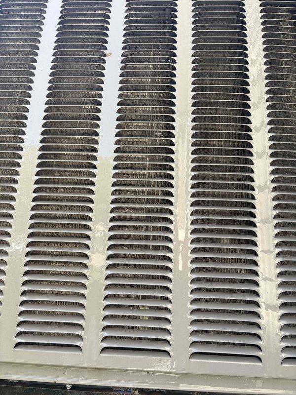 Completed preventive maintenance tune-up on 10-year-old heat pump system located on west wall. Performed comprehensive inspection of unit including electrical components, control boards, capacitor, and transformer; all found to be operating within normal parameters. Evaporator coil showed moderate dust accumulation on fins; noted for future cleaning to maintain optimal heat transfer efficiency and system performance.