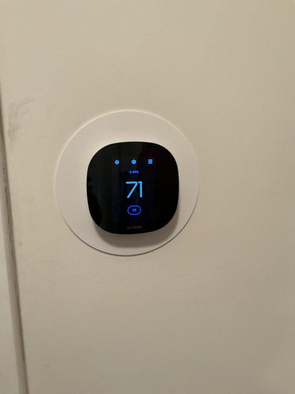 Completed cooling tune-up on Unico System unit located in attic space. Performed standard maintenance procedures including inspection of suspended mounting system, ductwork connections, and thermostat operation. Unit over 10 years old is operating within normal parameters, and ecobee thermostat is functioning properly at 71 degrees.