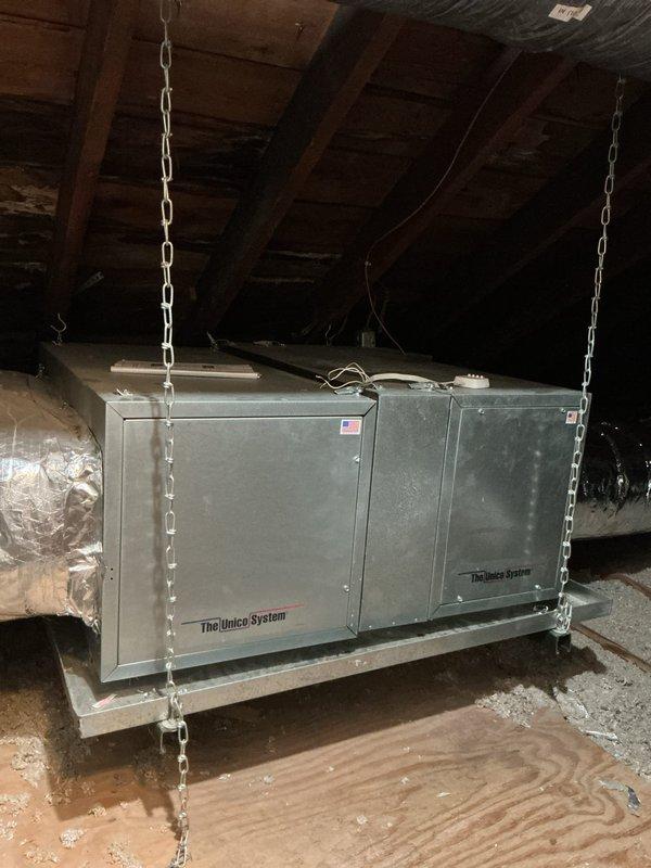 Completed cooling tune-up on Unico System unit located in attic space. Performed standard maintenance procedures including inspection of suspended mounting system, ductwork connections, and thermostat operation. Unit over 10 years old is operating within normal parameters, and ecobee thermostat is functioning properly at 71 degrees.