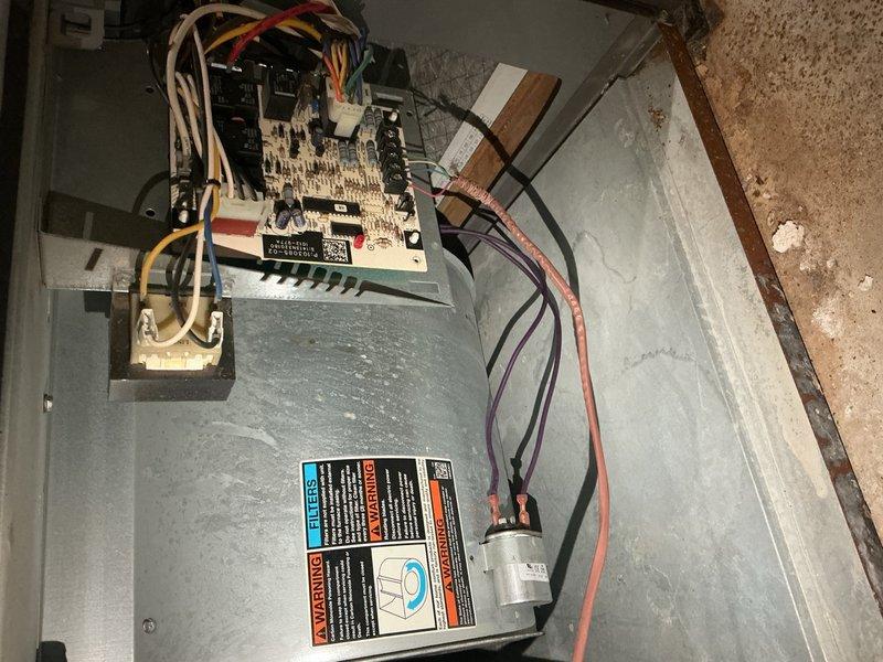 Completed cooling system tune-up on residential air handler unit located in side yard. Performed comprehensive maintenance including inspection of blower assembly and motor components, verified proper operation of control board and electrical connections, and documented equipment condition through photos. All components found to be functioning within normal parameters for a unit over 10 years of age.