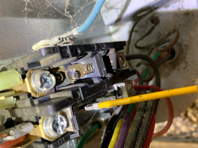 Responded to no heat call with reports of ice formation on refrigerant lines and cold air blowing from furnace. Upon inspection, discovered 9-year-old furnace system with excessive ice buildup on suction line, indicating refrigerant flow issues or potential heat pump reversing valve malfunction. Examined electrical connections at terminal block, which showed significant dust accumulation and aging components that could affect system operation. Assessed ductwork configuration and refrigerant line routing in attic space, noting proper insulation on copper lines but confirming abnormal ice formation consistent with heating mode failure. Documented existing conditions with photos showing HVAC components, electrical connections, and refrigerant line installation. Diagnosed system as requiring further evaluation of heat pump operation, reversing valve function, and potential defrost control issues causing unit to remain in cooling mode rather than heating mode.