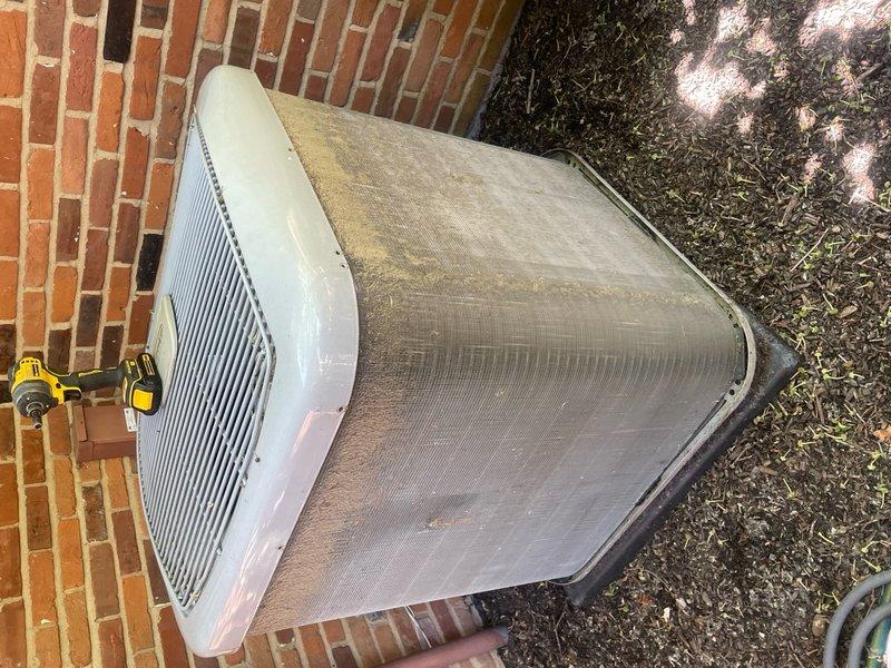 Completed comprehensive cooling season tune-up on 12-year-old residential AC system, including inspection of electrical components, contactors, and control board wiring within the outdoor unit. Removed heavy accumulation of dirt and debris from condenser coil guard and top mesh screen to restore proper airflow and system efficiency.