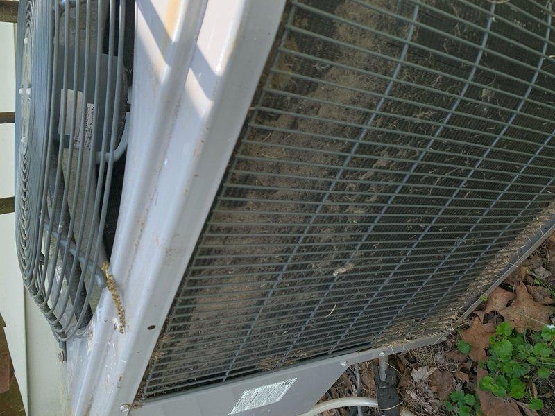 Completed comprehensive tune-up on an 8-year-old ground-mounted air conditioning condenser unit located at exterior first-floor laundry room area. Performed standard maintenance protocol including inspection of refrigerant lines, electrical connections, and condenser coil which showed significant dirt and debris accumulation restricting airflow. Cleaned condenser coils to restore proper heat exchange efficiency, verified proper operation of fan motor and compressor, checked refrigerant pressures, and ensured all connections were secure. Unit returned to optimal operating condition.
