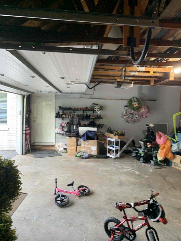 Conducted on-site evaluation of residential garage for Tesla electric vehicle charging station installation. Assessed existing electrical infrastructure, garage layout, and optimal charger placement location. Documented current conditions including electrical panel accessibility, available wall space for charger mounting, and distance from main service panel to proposed installation point to provide accurate estimate for EVSE installation.
