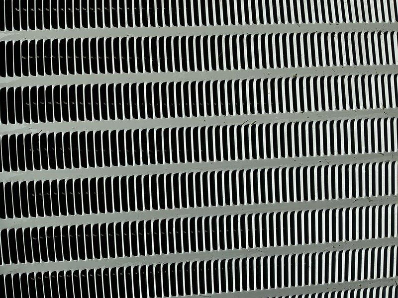 Completed comprehensive cooling maintenance on a 9-year-old air conditioning system. Performed AC tune-up including inspection of condenser coil fins, which were found to be in clean condition with proper airflow clearance, and replaced air filter in the indoor air handler unit. System tested and confirmed operational with all components functioning properly.