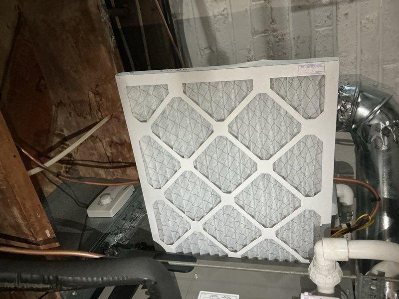 Completed comprehensive cooling system tune-up on two HVAC units located in attic, both over 10 years old. Performed standard maintenance protocol including filter replacement with new pleated media filters, electrical system diagnostics using digital multimeter to verify proper amperage and voltage readings, inspected condensing units and air handlers, checked refrigerant levels, cleaned components, and tested all safety controls to ensure optimal system performance for the cooling season.