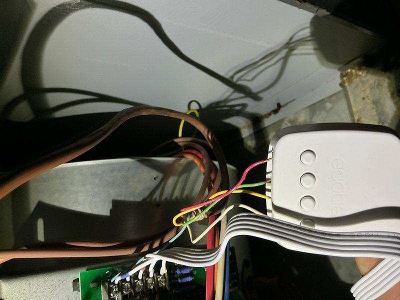 Responded to recall for HVAC system blowing cold air when heating mode selected. Inspected thermostat wiring and heat pump control board connections in attic space. Found improper wire terminations at reversing valve solenoid and control board causing system to remain in cooling mode regardless of thermostat setting. Corrected wire connections, secured all terminations properly, and verified proper operation of reversing valve. System now heating correctly per thermostat commands.
