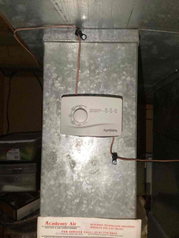 Replaced existing humidifier with AprilAire 600M whole-home humidifier unit on HVAC system. Fabricated and installed 10x10 metal patch on ductwork plenum to accommodate new equipment mounting. Removed and disposed of old humidifier unit, connected water supply lines, and verified system operation with heating and cooling functions.