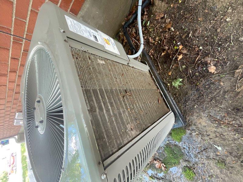 Completed outdoor portion of annual A/C maintenance on residential condenser unit. Performed comprehensive inspection of exterior components including condenser coil, fan assembly, and electrical connections. Cleaned accumulated debris, leaves, and organic matter from around unit base and concrete pad. Verified proper operation of condenser fan and assessed overall equipment condition. Unit operational upon completion of maintenance service.