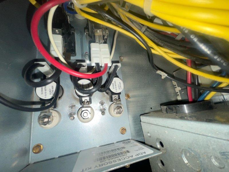Responded to no heat call for 10+ year old furnace system located in basement blowing cold air. Upon arrival, performed diagnostic inspection of air handler unit and electrical control panel. Inspected all electrical connections, wire terminals, capacitors, and circuit breakers within control panel. Verified proper wiring configuration including line voltage connections, control wiring, and safety circuits. Checked blower motor assembly and associated electrical components for proper operation. System restored to normal heating operation and tested to confirm proper temperature output.