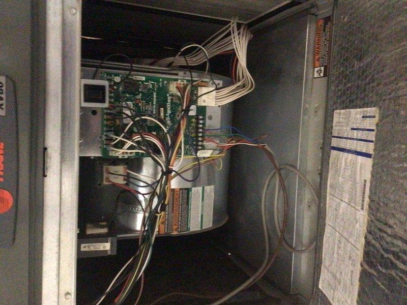 Completed annual cooling maintenance tune-up on residential HVAC system. Inspected electrical control cabinet components, wiring connections, and circuit board; verified proper operation of control module and transformer. Cleaned outdoor condenser coil fins and verified adequate airflow through unit. System tested and confirmed operational with all components functioning within normal parameters.