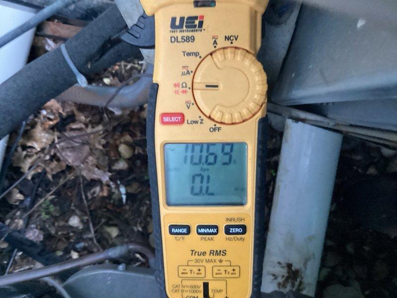 Completed comprehensive cooling tune-up maintenance on two outdoor AC units. Performed standard diagnostic testing including temperature differential measurements showing 100.3°F readings and amp draw verification at 44.9 amps on condenser fan motor, confirming both systems operating within normal parameters.