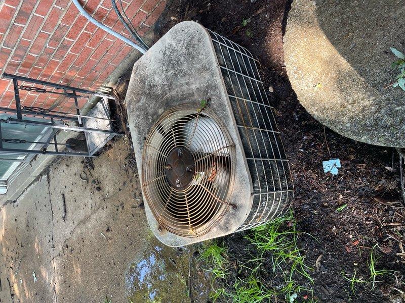 Completed preventative maintenance tune-up on single outdoor AC condenser unit per Home Depot service agreement. Performed standard inspection of exterior unit showing significant weathering and dirt accumulation on casing and top grille, as well as indoor air handler components displaying rust staining on cylindrical sections. System operational at time of service with routine maintenance procedures completed on both outdoor and indoor HVAC equipment.
