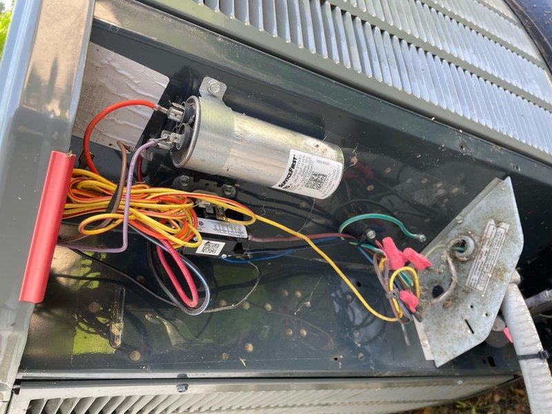 Completed comprehensive cooling system tune-up on basement-located O10 unit. Performed standard maintenance protocol including inspection of capacitor, electrical connections, control boards, and all associated wiring components. All systems tested and verified operational, with photographic documentation captured of internal components showing normal wear consistent with unit age.