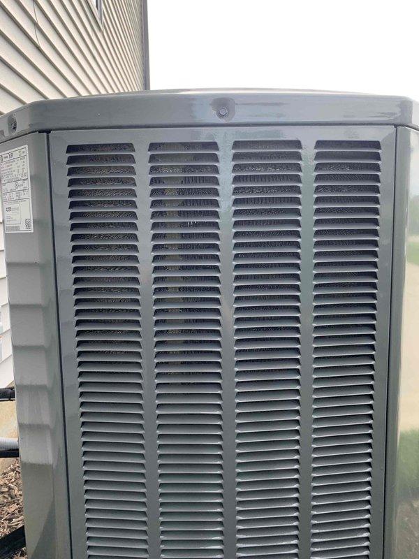 Completed annual AC tune-up on a Trane XR outdoor condensing unit. Performed comprehensive preventive maintenance including inspection of all components, cleaning of condenser coils, verification of proper airflow through louvered panels, and system performance testing. Unit found to be operating within normal parameters with no immediate repairs required.