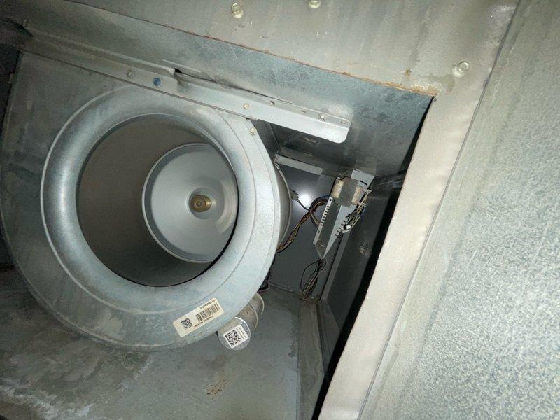 Completed comprehensive air conditioning tune-up service on single residential unit with indoor air handler located in basement and outdoor condensing unit. Performed standard maintenance protocol including inspection of blower assembly, electrical connections, and heat exchanger coil which showed moderate dirt accumulation on fins. System operational upon completion with all components functioning within normal parameters.