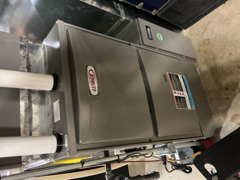 Completed comprehensive tune-up maintenance on a 23-year-old Lennox HVAC system with outdoor condenser unit. Performed standard preventive maintenance procedures including inspection of condenser coil fins, verification of refrigerant levels, examination of electrical connections, and assessment of overall system operation. Condenser coils found in satisfactory condition with minimal debris accumulation; unit operational and functioning within normal parameters at time of service completion.