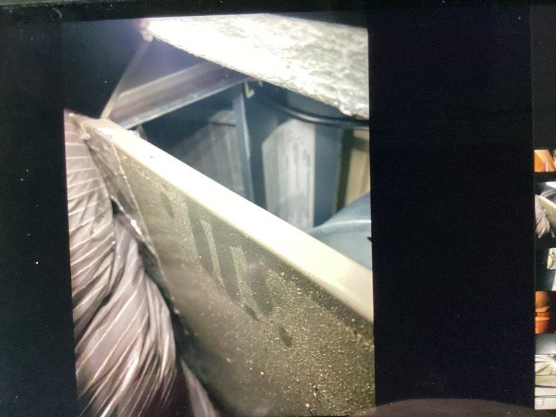 Responded to service call for 11-month-old upstairs attic unit experiencing noise when off and emitting musty odor. Upon inspection, found severely clogged 20x25x1 air filter with heavy dust and debris accumulation, restricting airflow and contributing to odor issue. Discovered significant condensation buildup on evaporator coil and interior ductwork, indicating inadequate airflow and potential drainage concerns. Replaced dirty air filter with new unit to restore proper airflow. Inspected condensate drain system and cleared minor blockage to ensure proper drainage. Cleaned evaporator coil surfaces to remove accumulated moisture and debris. Verified system operation after filter replacement, confirming reduced noise levels and improved air circulation. Advised homeowner on importance of regular filter changes every 30-60 days to prevent future airflow restrictions and maintain system efficiency. Unit operating normally at time of departure with proper airflow and no abnormal sounds dete