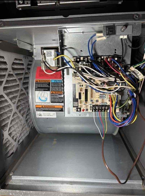 Completed comprehensive cooling system tune-up on 6-year-old ground-mounted AC unit. Performed full system inspection including electrical connections, refrigerant levels, and airflow verification. Replaced thermostat battery per customer request, inspected control board and wiring harness for proper operation, and cleaned condenser coil exterior surfaces. All components tested and operating within manufacturer specifications.