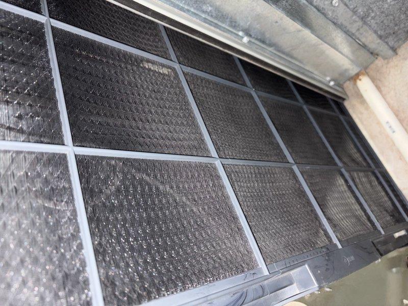 Completed comprehensive air conditioning tune-up service on single outdoor unit for Home Depot customer. Performed standard maintenance protocol including inspection of air filter assembly, which showed moderate dust and debris accumulation in mesh screens, and examined evaporator coil condition. All system components were evaluated and photographed for service documentation, with unit confirmed operational upon completion.
