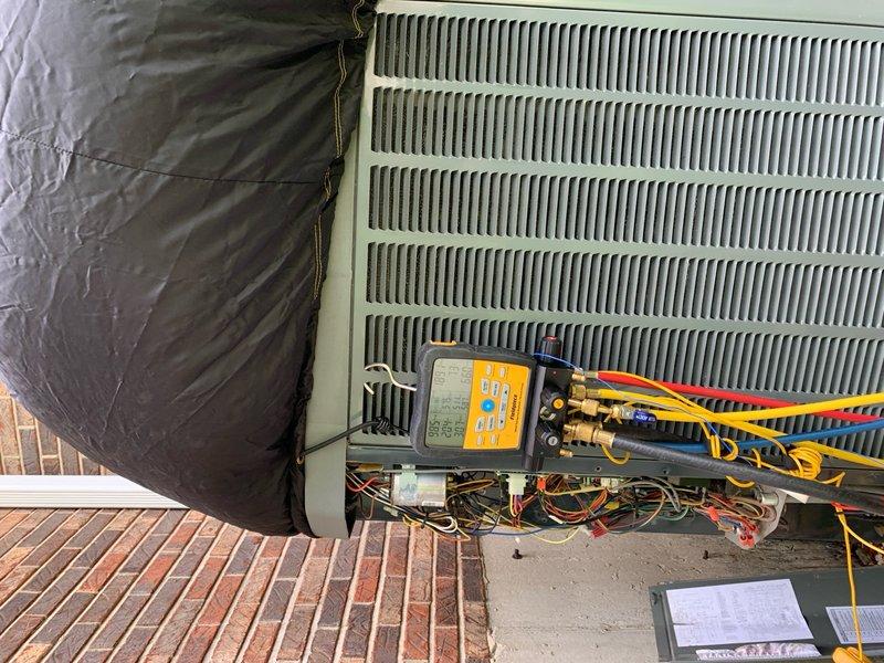 Completed comprehensive cooling system tune-up on 14-year-old outdoor condensing unit located at side of home. Performed full system diagnostics using manifold gauges to verify refrigerant pressures and temperatures, checked electrical connections, and inspected air filter condition. Unit operational and running within manufacturer specifications at time of service completion.